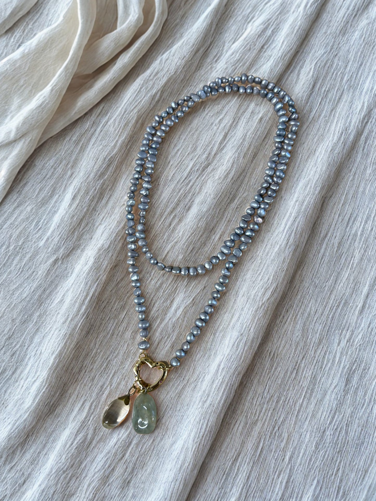 Ketting parel en topaas